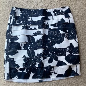 - Layered /tiered skirt worn once. Zip closure